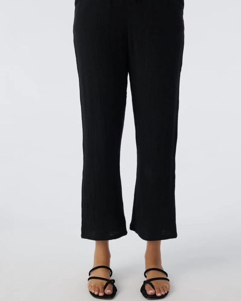 Front of a model wearing a size XL O'Neill Brenda Double Gauze Pants in Black in Black by O'NEILL. | dia_product_style_image_id:338225